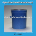 White ceramic tea canister with plastic cover